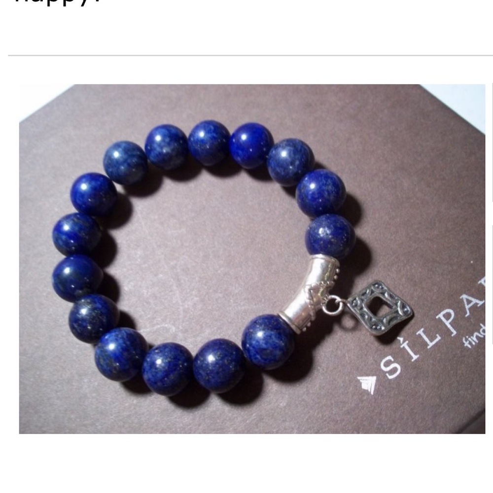 Silpada Deep Blue Lapis stretch Bracelet with Silver Charm